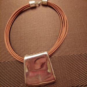 Multi Strand leather necklace with large sterling silver pendant